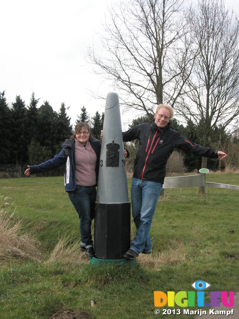 P1011278 Jenni and Marijn by border marker between Belgium and the Netherlands